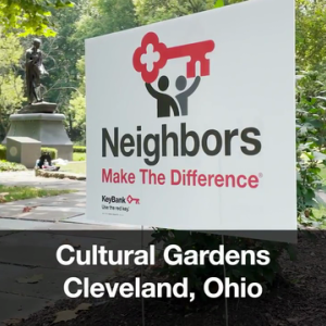 Sign in park reading, "Neighbors Make The Difference"