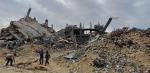 Children amongst sand and rubble