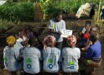 Rodger teaches fellow volunteers about the importance of a healthy diet.