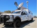 Cisco truck with dish and tower on top