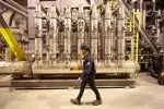 Factory worker walking in factory
