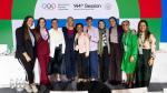 Group photo of Kirsty Coventry surrounded by other women