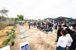 Students joined alongside volunteers to help transform the school's garden into a vibrant learning environment.