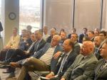 people sitting in an audience 