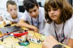 students working on a circuit board