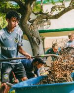 Volunteers helped mulch and lay down fresh soil.