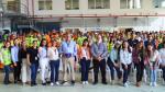 A large group of people posing and smiling