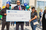 People holding an oversized check from Fifth Third