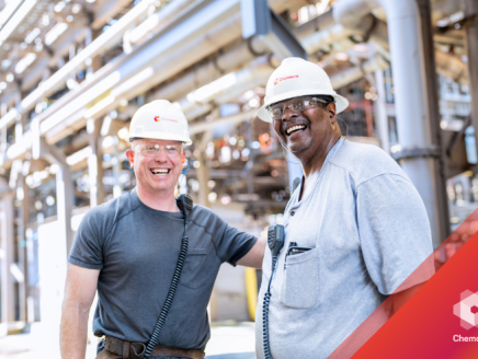 people wearing helmets smiling together