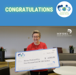 Dorota Pradziad-Hyc holding check from Sofidel