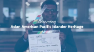 A person holding a clapboard. "Celebrating Asia American Pacific Islander Heritage" super imposed on top.