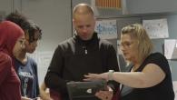 Jack Maher, a math teacher, shows students the augmented reality app.
