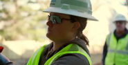 Georgia Hummel in hard hat and vest.