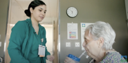 A nurse is assisting a patient with a beverage.