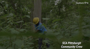 KeyBank SCA Pittsburgh community crew member working in a green space.