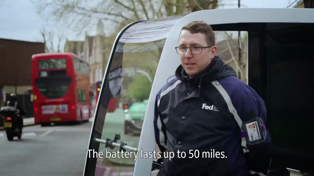 Image of man in FedEx jacket next to courier bike