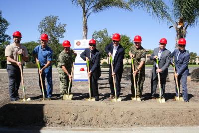 From left to right: Mick Wasco, Marine Corps Air Station Miramar energy program manager; Richard Johnston, Naval Facilities operations and maintenance officer; Lt. Cmdr. Travis Brinkman, MCAS Miramar public works officer; Dave Guebert, San Diego Gas and Electric federal account representative; Scott Kinner, Black & Veatch vice president; Col. Jason Woodworth, MCAS Miramar commanding officer; Andy Haun, Schneider Electric chief technology microgrids officer; and Howard Ou, Congressional Office general services fellow.