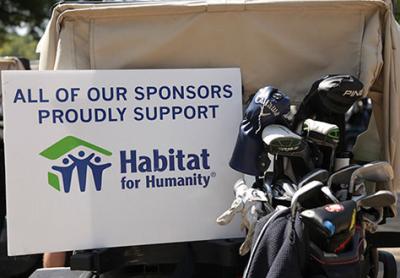 Hosting a golf tournament that raised $107,000 to build a home through Habitat for Humanity of Gordon County, Georgia.