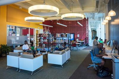 The lobby of the PNC Fairfax Connection serves as a technology center, learning space, visiting area and library