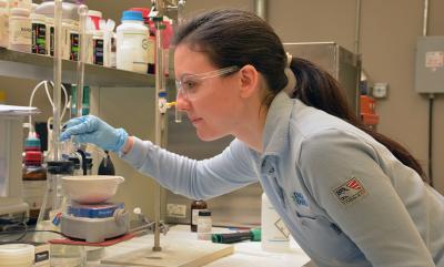 Process Engineer Emily Myers analyzes water samples to ensure quality. Samples are tested for metals, alkalinity, chlorine, total suspended solids and oil and grease. In the plant’s environmental lab, technicians test samples to ensure the site meets water quality standards and environmental permitting requirements.