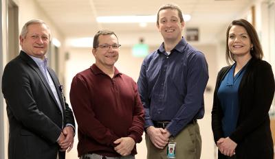 Putnam County Hospital CEO Dennis Weatherford, Director of Plant Operations Jeff Mace, Duke Energy employees Andrew Taylor and Jessie Jackman.