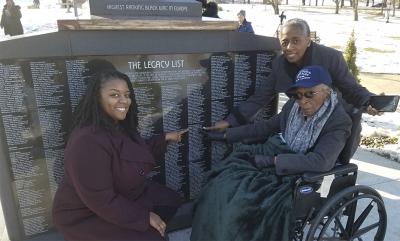 Tiffany and Cynthia Scott with their mother and grandmother Bernice Baker Johnson at a monument dedicated to her battalion in Ft. Leavenworth, Kansas.