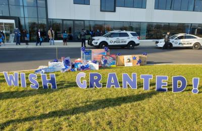 Eight-year-old Antonio of Camden, NJ received the surprise of a lifetime – a fleet of Subaru vehicles, led by a Camden County Police Department escort, drove past his home, each car carrying gifts. Photo credit: Camden County Police Department