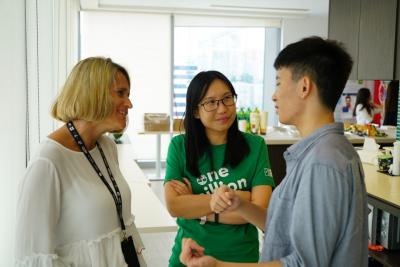 An associate from Project Share mingles with a Timberland employee and one of the participants during Timberland Hong Kong’s first annual career day for disadvantaged youth.