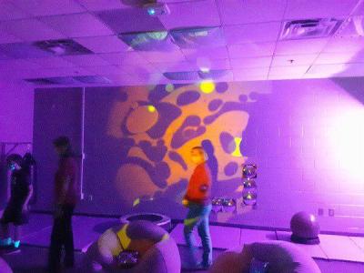 Images projected on a wall in the sensory room of New Hope Middle School "are never the same, and kids like that," said teacher Cami Baldivid. "It's a lot like a lava lamp." (Ryan Anderson/Daily Citizen-News)