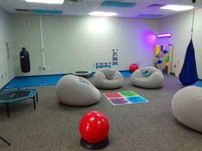 The new sensory room at New Hope Middle School features, among other offerings, a punching bag, trampoline, swing and comfortable chairs. (Ryan Anderson/Daily Citizen-News)