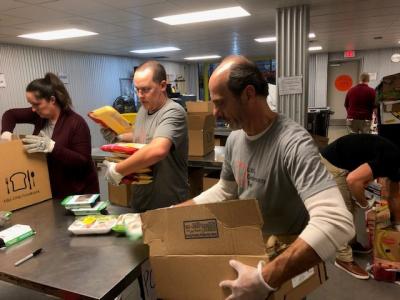 Team members worked with the Mid Ohio Food Bank to sort food donations which will then be distributed to food pantries across central and eastern Ohio.