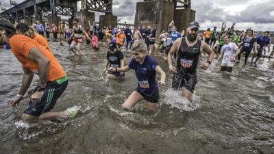 Volunteers take the plunge at Keep Virginia Beautiful's 4th annual "Shiver in the River." (Photo by Dave Parrish)