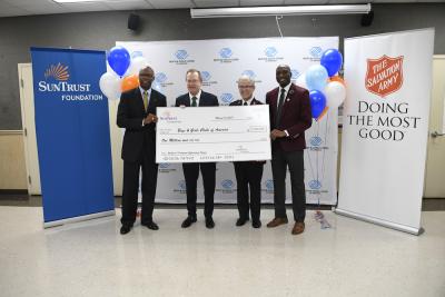 The SunTrust Foundation presents a $1 million grant to Boys & Girls Clubs of America to support workforce readiness in a ceremony on Friday, March 15, 2019. Pictured left to right: Stan Little, president, SunTrust Foundation; Jim Clark, president & CEO, Boys & Girls Clubs of America; Major Bob Parker, The Salvation Army Metro Atlanta Command; and Joshua Dickerson, executive director, The Salvation Army Boys & Girls Clubs of Greater Atlanta.