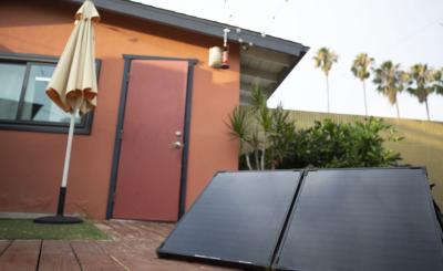 The solar panel charges the backup battery when electricity isn’t available to allow continued use of medical equipment. PHOTO CREDIT: JOSEPH FOULK