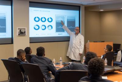 Stuart Ritter, a senior financial planner at T. Rowe Price, discusses asset allocation with Baltimore Collegiate School for Boys students