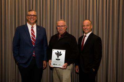 Award presentation: From left to right: Donny Simmons, president, Trane Commercial HVAC North America, Europe, Middle East and Africa, left, presents Dwayne Atkins, engineering manager, Ford Motor Company, middle, Trane’s Energy Efficiency Leader Award, alongside Parry Hughes, VP & general manager, Trane Michigan, right.
