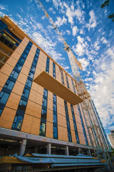 Brock Commons, a student residence hall at the University of British Columbia in Vancouver, Canada is constructed of mass timber panels by Structurlam using Henkel adhesives. Use of pre-fabricated mass timber panels helped to increase construction speed of the 53-meter tall structure.