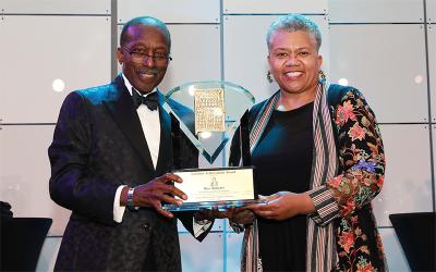 Left to right: Roy Roberts, retired GM executive, 2020 GMAAN Lifetime Achievement Award Recipient and Telva McGruder, president of GMAAN and director of Facility Engineering and Manufacturing Operations in Sustainable Workplaces. (Andrea Stinson)