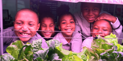 Students at Amidon-Bowen Elementary in Washington, D.C. excited about the fast growth of their salad greens.
