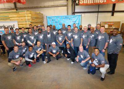 Some of the current and former Major League Baseball Players who gathered at the Habitat for Humanity warehouse in Dallas, TX to build frames for homes destined for Houston flood victims