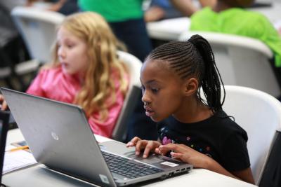 Students try out an early preview of the new Minecraft Tutorial at the Skyway Boys & Girls Club, in Skyway, Washington, on Oct. 16, 2017.