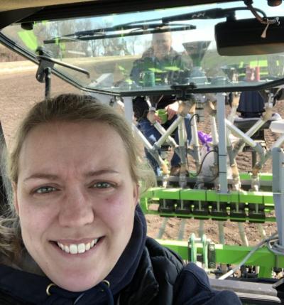 Koryne Carlson, and colleague Paul Richter, getting ready to plant the first field in 2020. Carlson drives while Richter rides on the planter dumping packets of seed, each a different variety, every 20 feet. Each year, the General Mills agronomy team compiles an approved seed variety list so that oat buyers know which varieties have the best milling and nutritional characteristics.