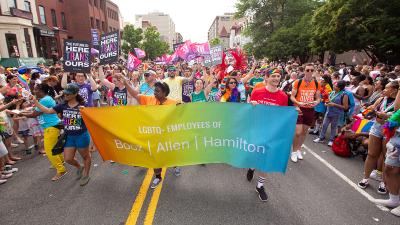 Firm employees celebrate during PRIDE 2019 in Washington, D.C. This year’s theme is “Pride Springs Forth” as we re-emerge from the challenges of 2020 and spring forth into 2021—together.