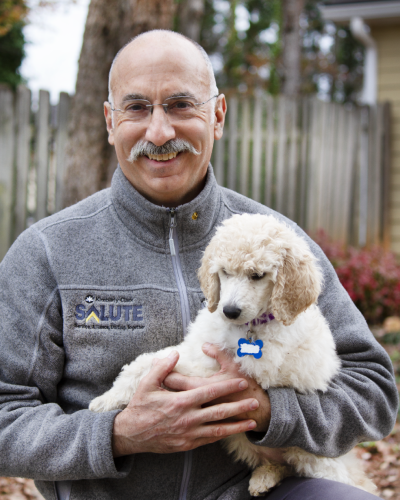 Kimberly, a VetDog, will live with Kimberly-Clark employee John Dellasala for roughly 14-18 months. During this time, Dellasala and his family will socialize her and teach her basic obedience.