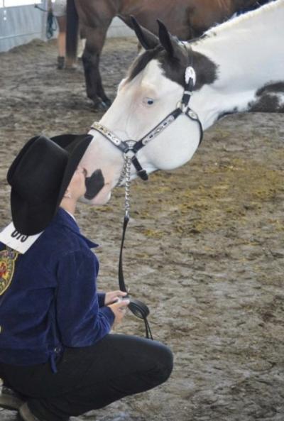 Koryne Carlson and Jay waiting for the showmanship class to begin at the 2011 Iowa State Fair. Jay has always loved to give kisses.