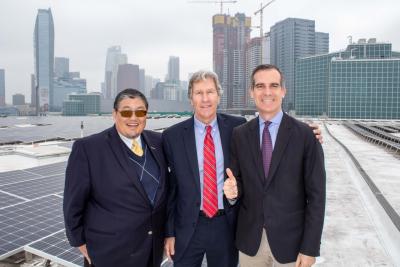 Doane Liu, Executive Director of the City of Los Angeles Department of Convention and Tourism Development; Brad Gessner, Senior Vice President of AEG Facilities and General Manager of the LACC and Mayor Eric Garcetti celebrate Los Angeles’ No. 1 status as most solar powered city in the United States at the solar array installation on the roof of the Los Angeles Convention Center on April 4, 2018.