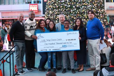 The AEG Community Foundation awards one of its first macro grants to Little Tokyo Service Center in Los Angeles during AEG's annual Community Holiday Party at L.A. LIVE on December 17, 2019.