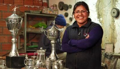 Silvia Montes Cupi learned metalworking from her father and decided to open her own shop. She grew her small business with support and capital from microfinance bank BancoSol.
