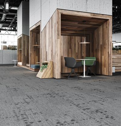The new Relaxing Floors carpet plank collection utilizes fractal patterning to give our eyes a break from the digital world and deliver the essence of nature to the contract built environment. Photography courtesy of Mohawk Group.