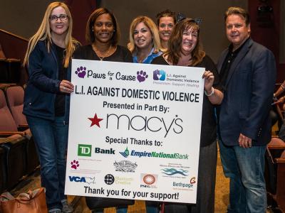 Paralegal Pennie Vakkas (far left), serves on the LIADV planning committee, which organizes events such as the annual Paws for a Cause.